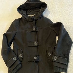 Cute women’s black waist length jacket.